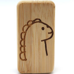 Close-up of kids' bamboo nail brush engraving on sustainable bamboo
