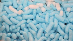 blue and white biodegradable plastic free packing peanuts made from starch material