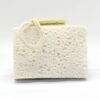 Jeremy cellulose sponge shown upright with hanging loop on a white background